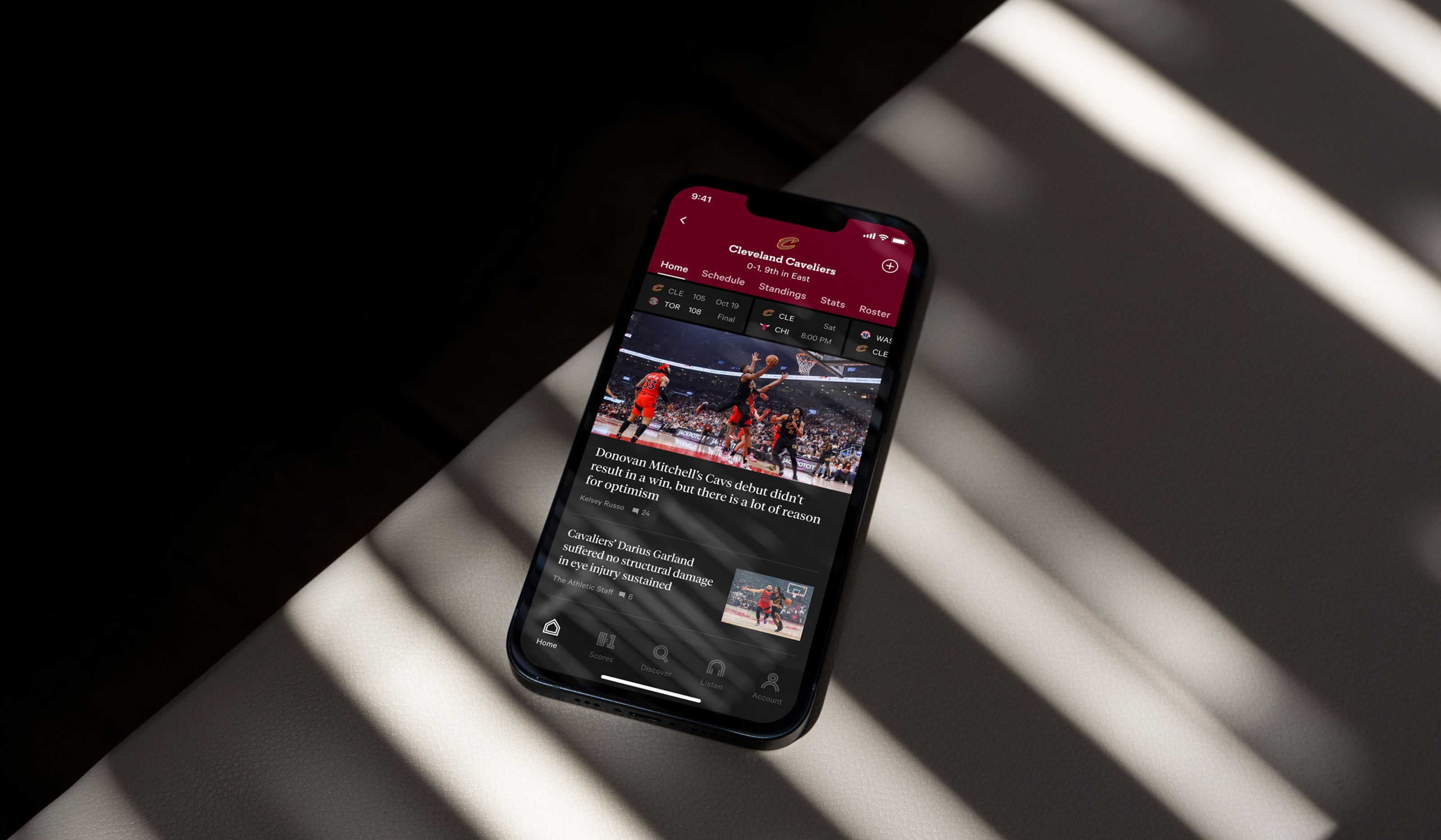 Phone-on-a-table-with-Cleveland-Caveliers-news-app-displayed.jpg
